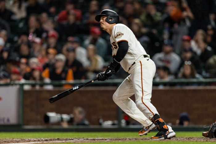 SF Giants first baseman Wilmer Flores watches his two-run home run against the St. Louis Cardinals. (April 26, 2023)